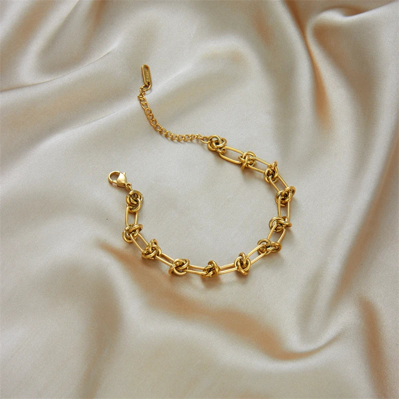 Pulseira Dourada nó em Aço